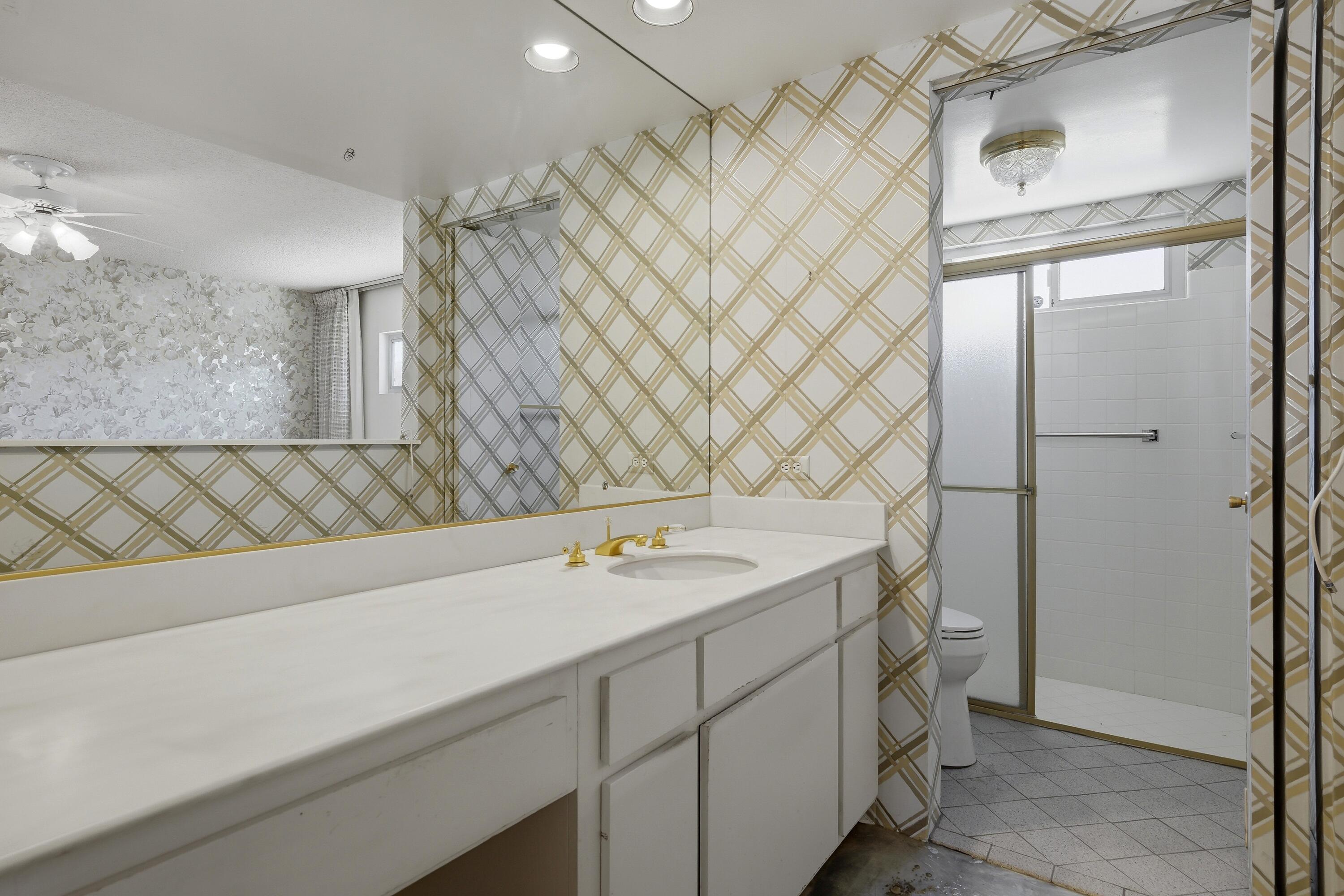 36990 Ferber Drive Rancho Mirage, CA 92270 - Photo 22 of 29 a bathroom with a sink and a mirror