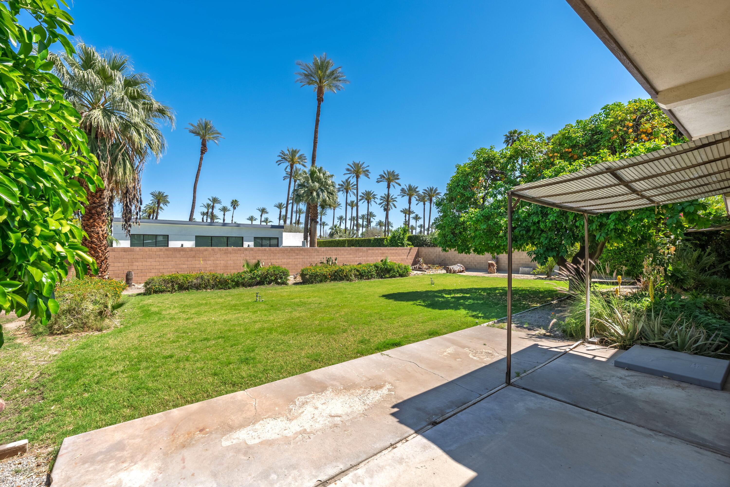 36990 Ferber Drive Rancho Mirage, CA 92270 - Photo 24 of 29 a view of a garden with a slide