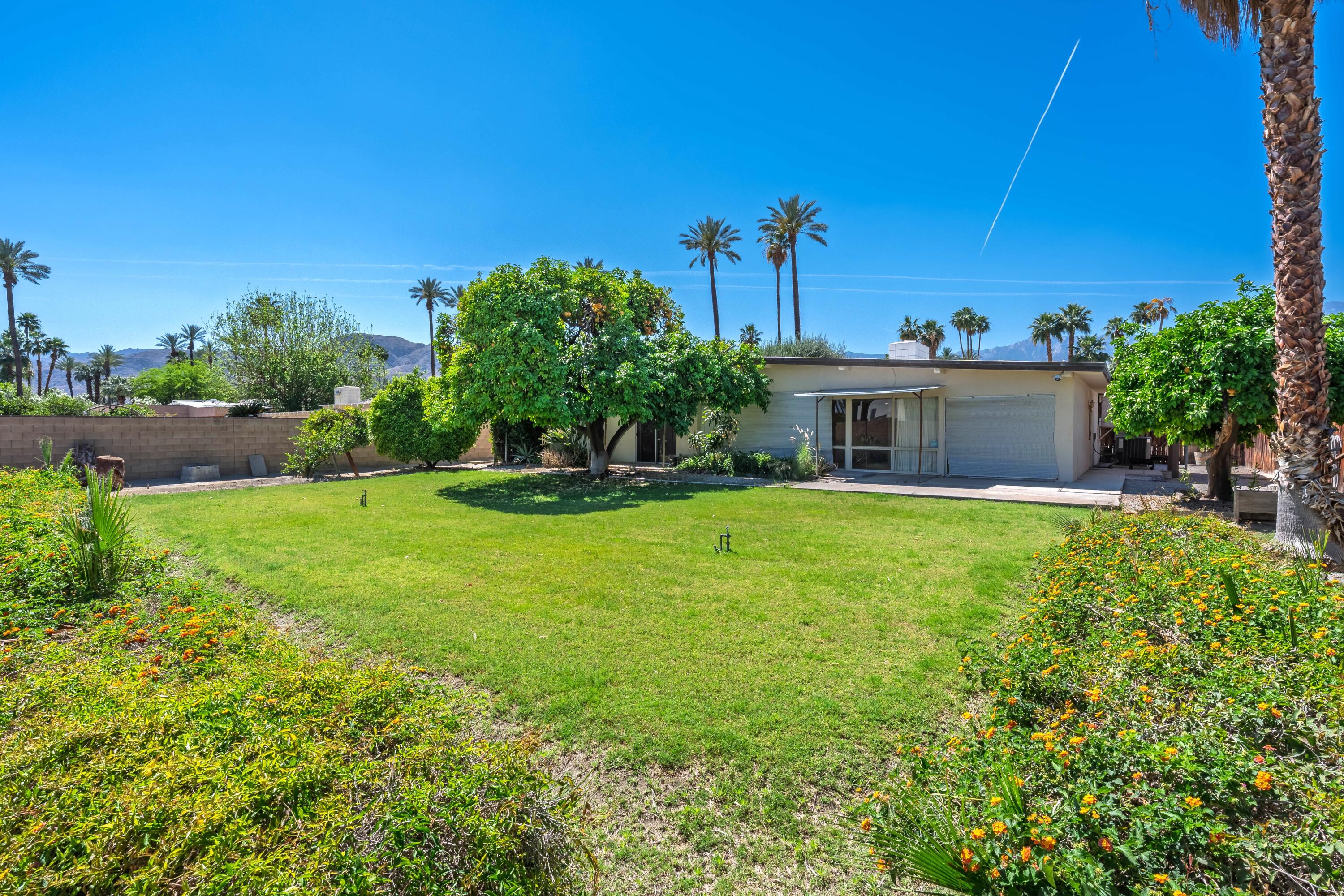 36990 Ferber Drive Rancho Mirage, CA 92270 - Photo 26 of 29 a house view with a garden space