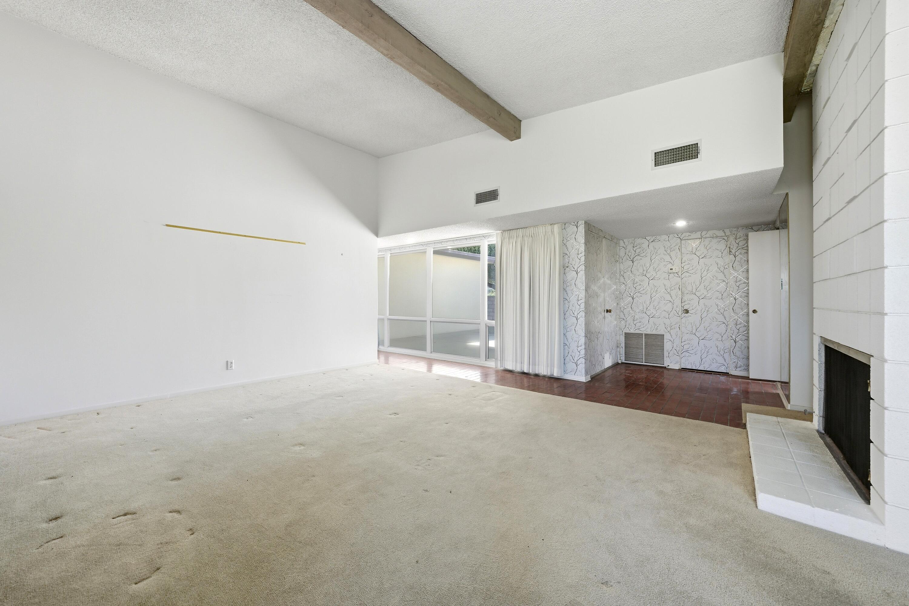 36990 Ferber Drive Rancho Mirage, CA 92270 - Photo 8 of 29 a view of an empty room with a fireplace