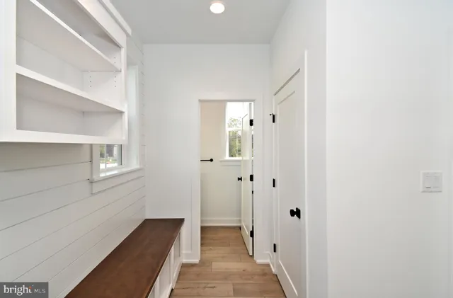 an aerial view of a livingroom with furniture