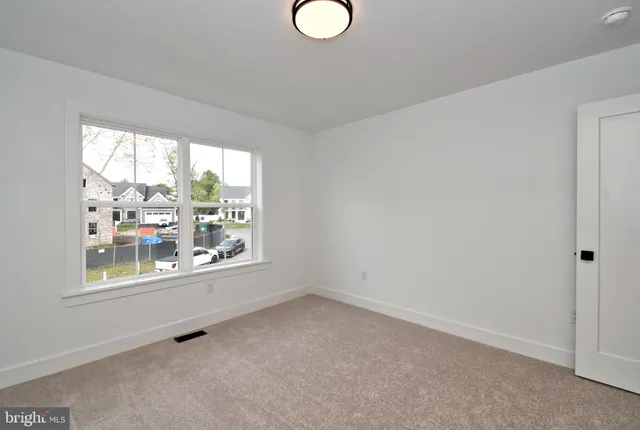 a view of a room with an empty space