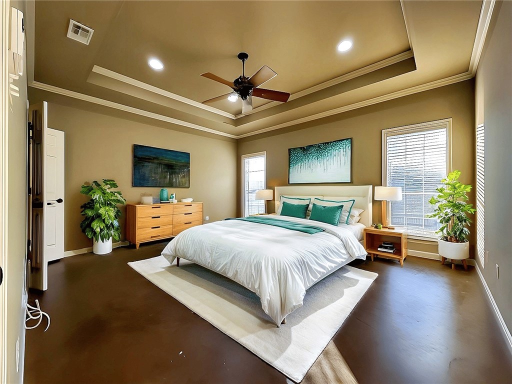 23 North Shore Circle Waco, TX 76708 - Photo 17 of 32 a spacious bedroom with a bed and a flat screen tv