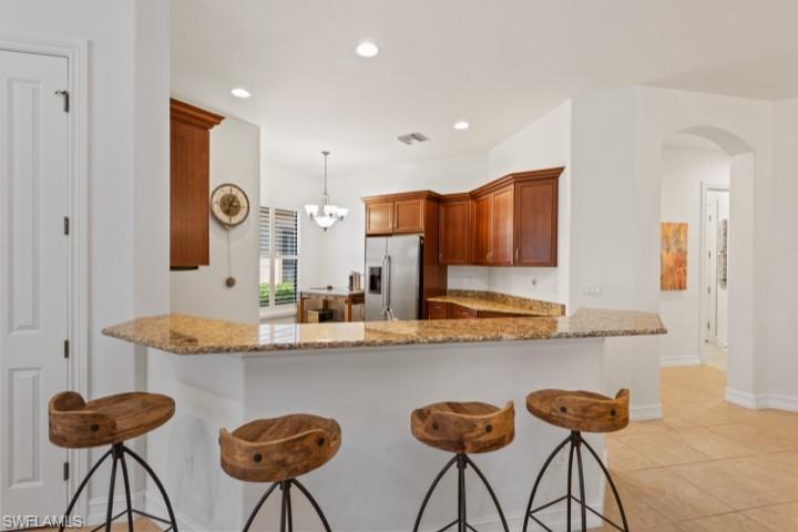 7539 Moorgate Point Way Naples, FL 34113 - Photo 13 of 16 Kitchen Bar