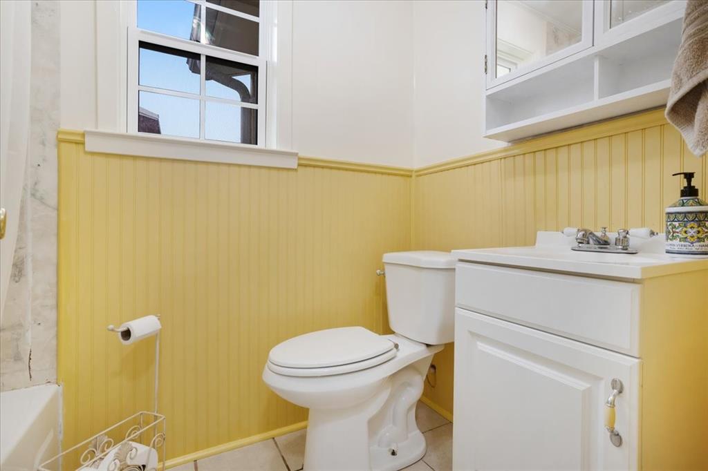 4149 County Road 4510 Commerce, TX 75428 - Photo 19 of 27 a bathroom with a sink and a toilet