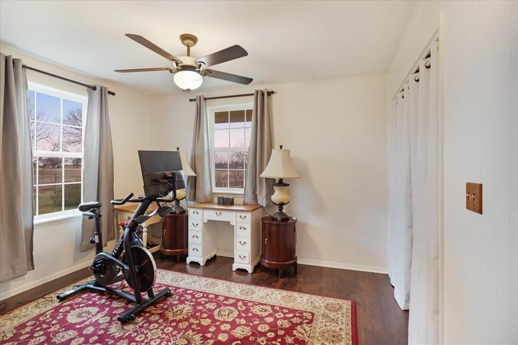 4149 County Road 4510 Commerce, TX 75428 - Photo 20 of 27 a view of workspace with windows