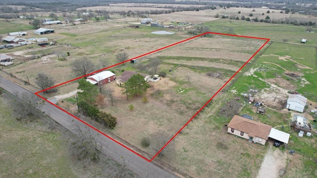 4149 County Road 4510 Commerce, TX 75428 - Photo 2 of 27 a view of a tennis court