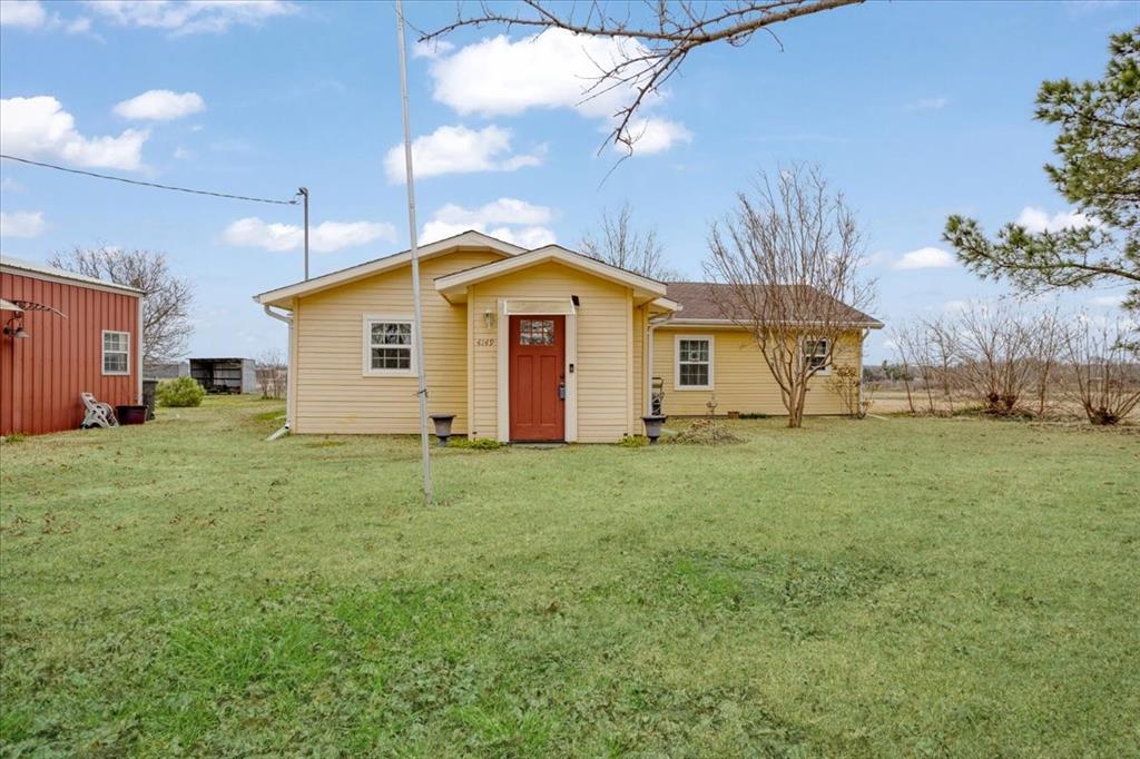 4149 County Road 4510 Commerce, TX 75428 - Photo 4 of 27 a front view of house with yard and trees