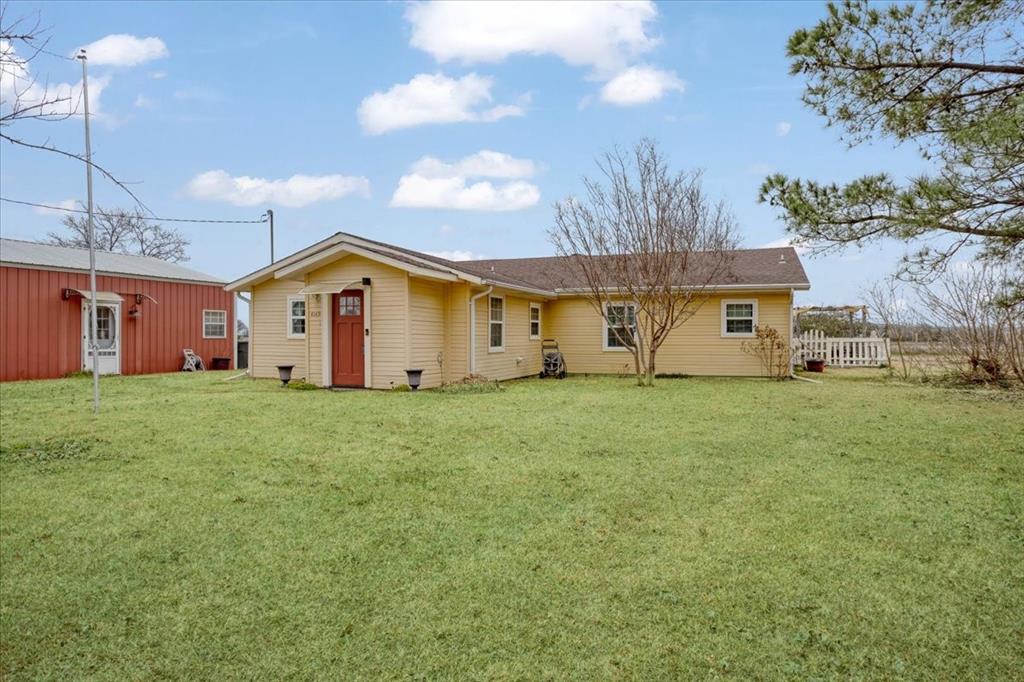 4149 County Road 4510 Commerce, TX 75428 - Photo 5 of 27 a view of a yard with a house