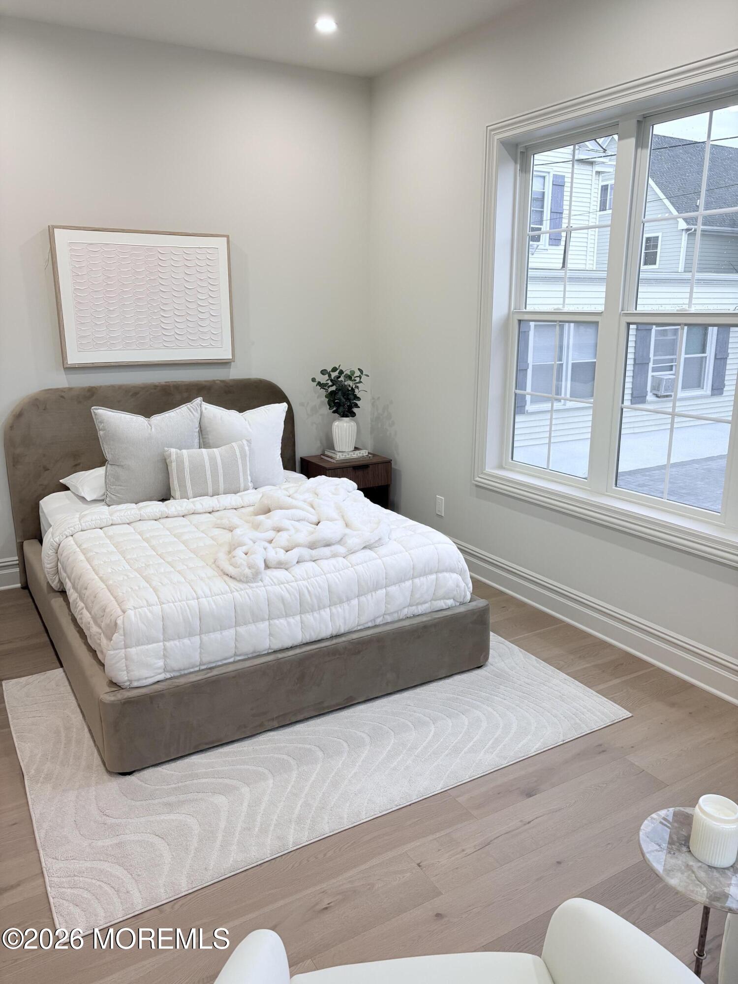 306 3rd Avenue Asbury Park, NJ 07712 - Photo 11 of 23 1st floor bed