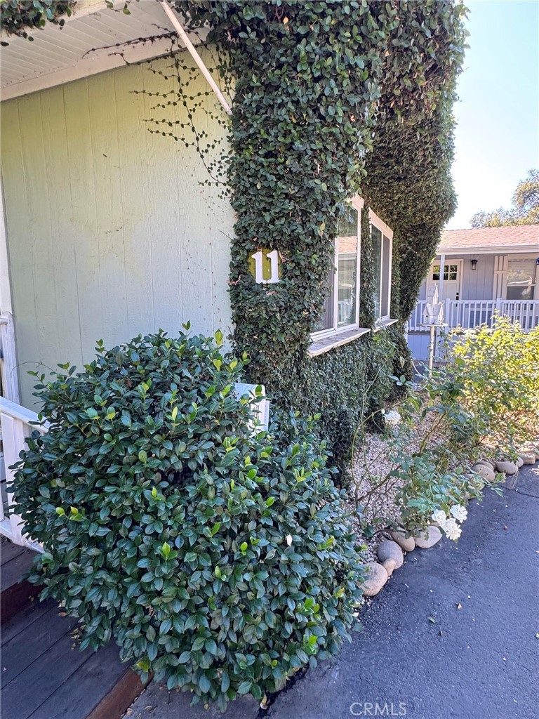 1273 South Rice Road, Unit 11 Ojai, CA 93023 - Photo 3 of 65 Exterior Front with Lush Foliage