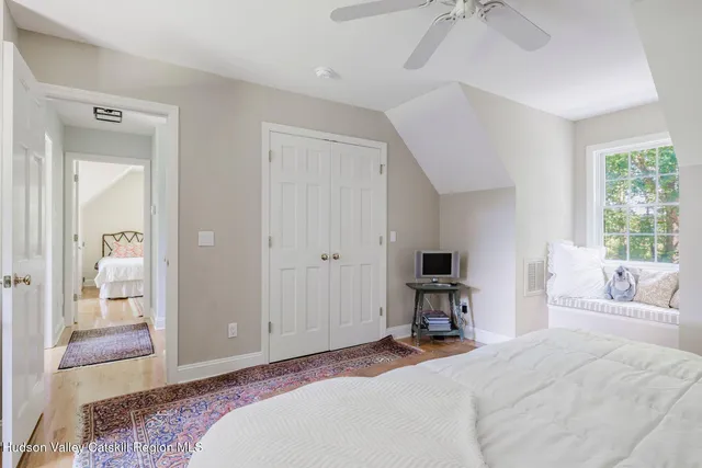 a bathroom with a sink and a window