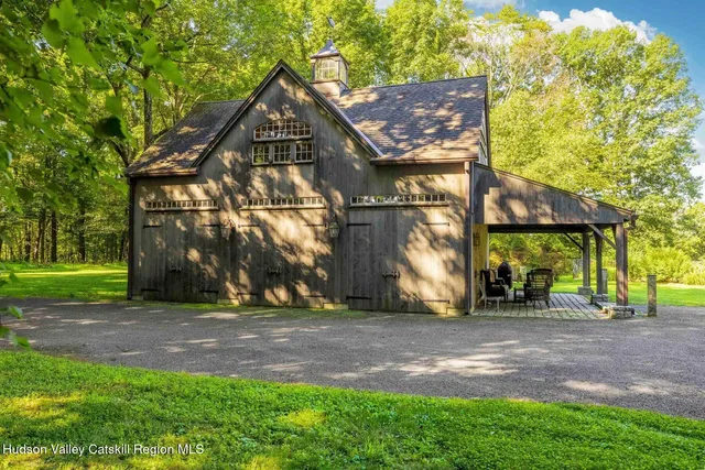 a view of a backyard of the house
