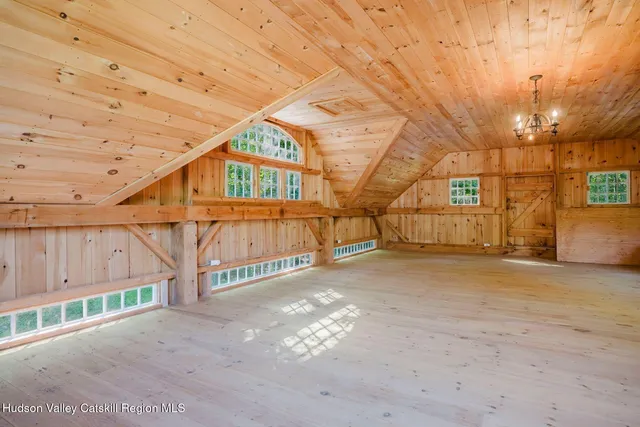 a view of a street with a building in the background