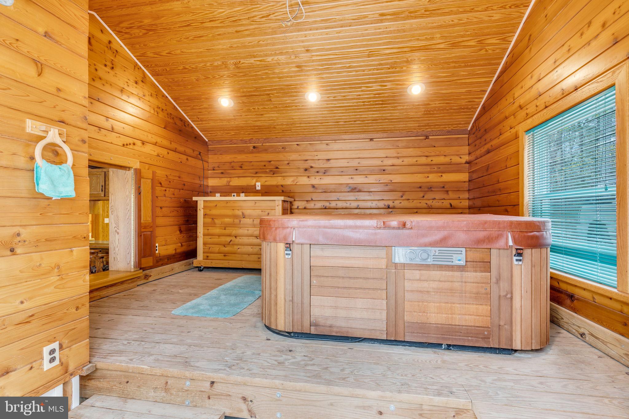 945 New Road Orrtanna, PA 17353 - Photo 9 of 58 Hot tub room with heat and shower.