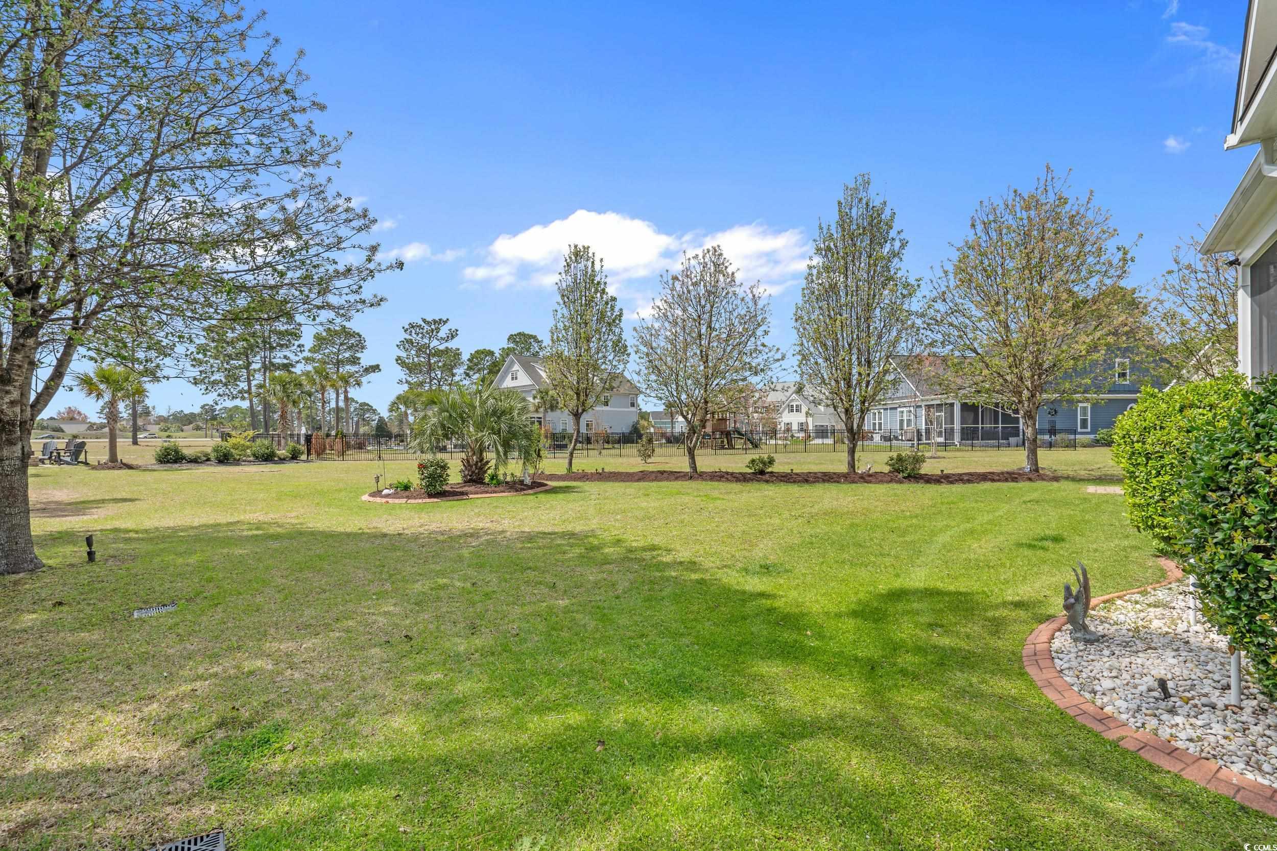 416 Seabury Lane Myrtle Beach, SC 29579 - Photo 14 of 39 Wooden terrace with a lawn