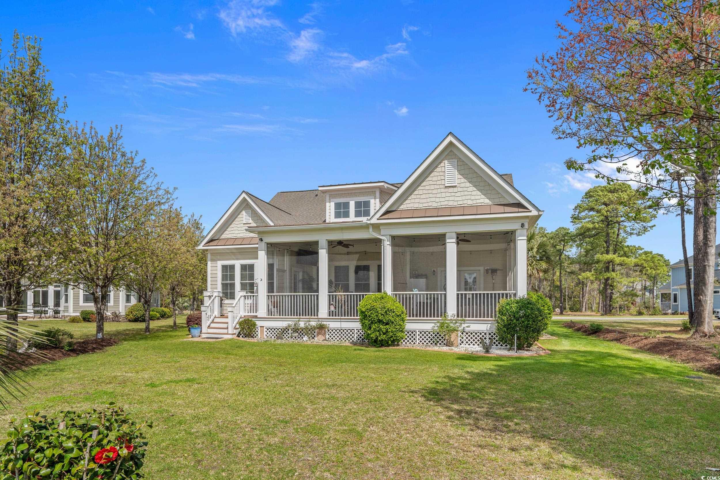 416 Seabury Lane Myrtle Beach, SC 29579 - Photo 16 of 39 View of patio with a fire pit and a water view