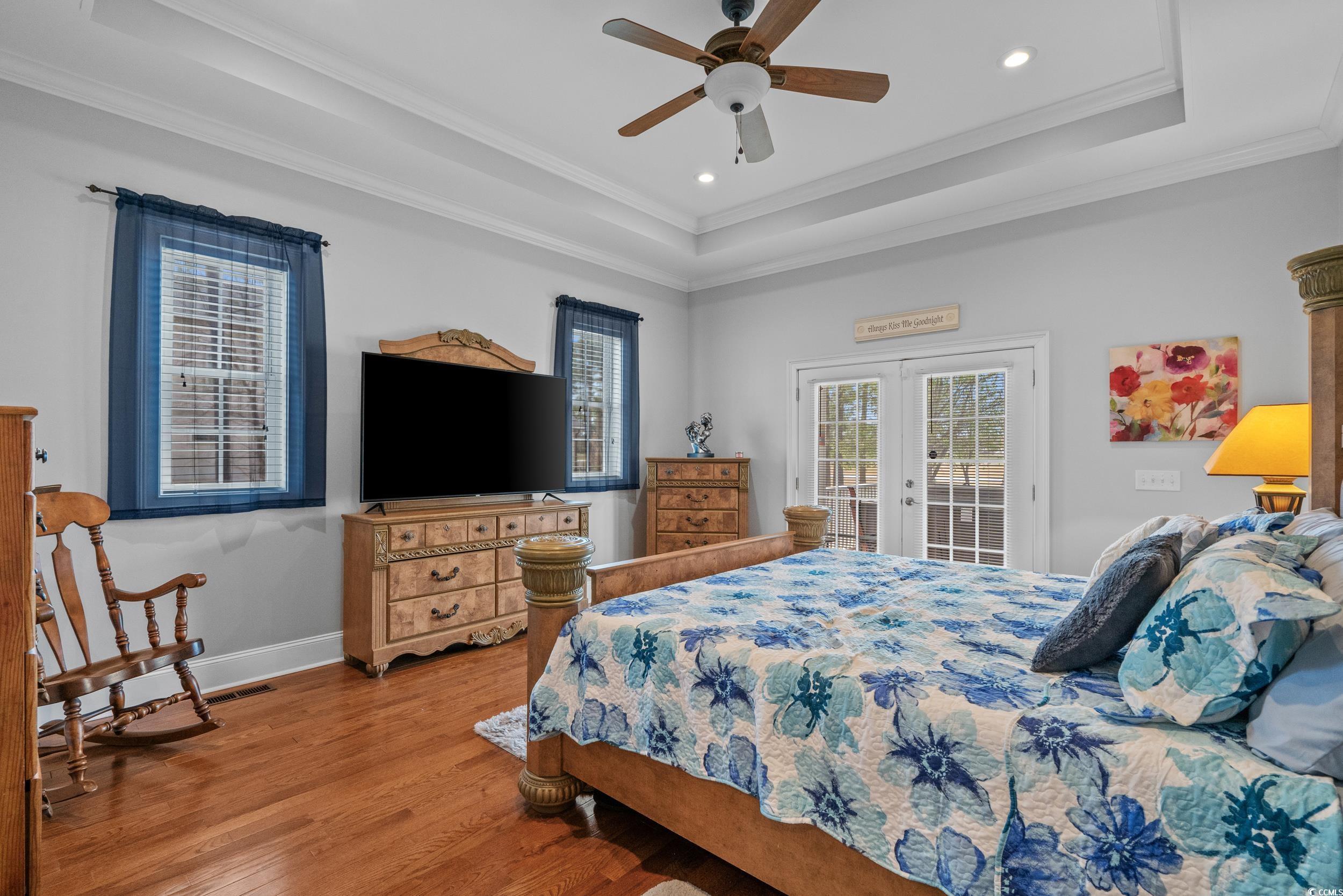 416 Seabury Lane Myrtle Beach, SC 29579 - Photo 17 of 39 Rear view of property with a lawn, a sunroom, metal roof, and a ceiling fan