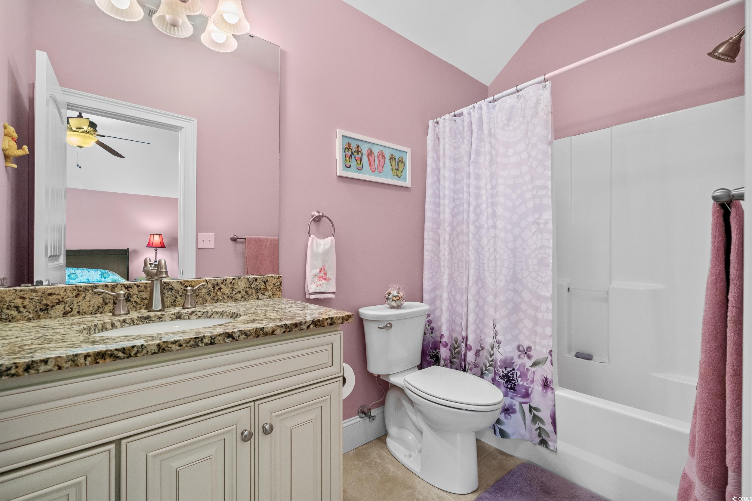 416 Seabury Lane Myrtle Beach, SC 29579 - Photo 26 of 39 Bedroom with vaulted ceiling, baseboards, visible vents, light wood-style floors, and ceiling fan