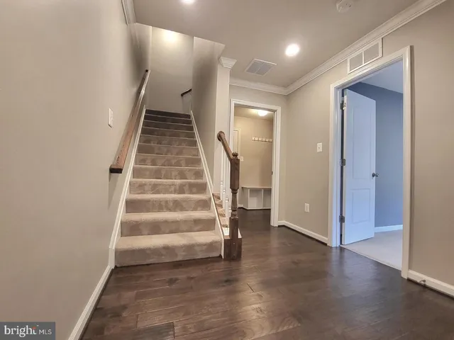 a view of an entryway with stairs