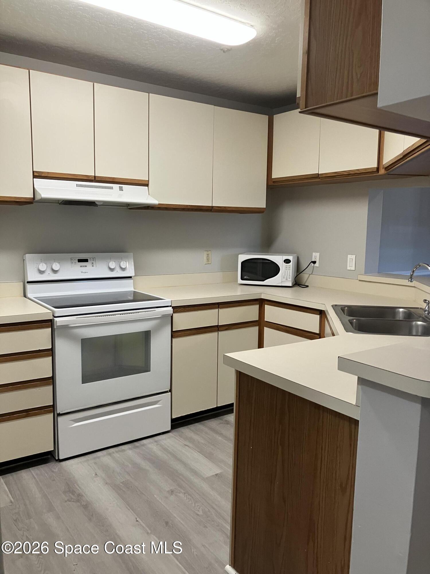 7667 North Wickham Road, Unit 1517 Melbourne, FL 32940 - Photo 13 of 22 Kitchen 1