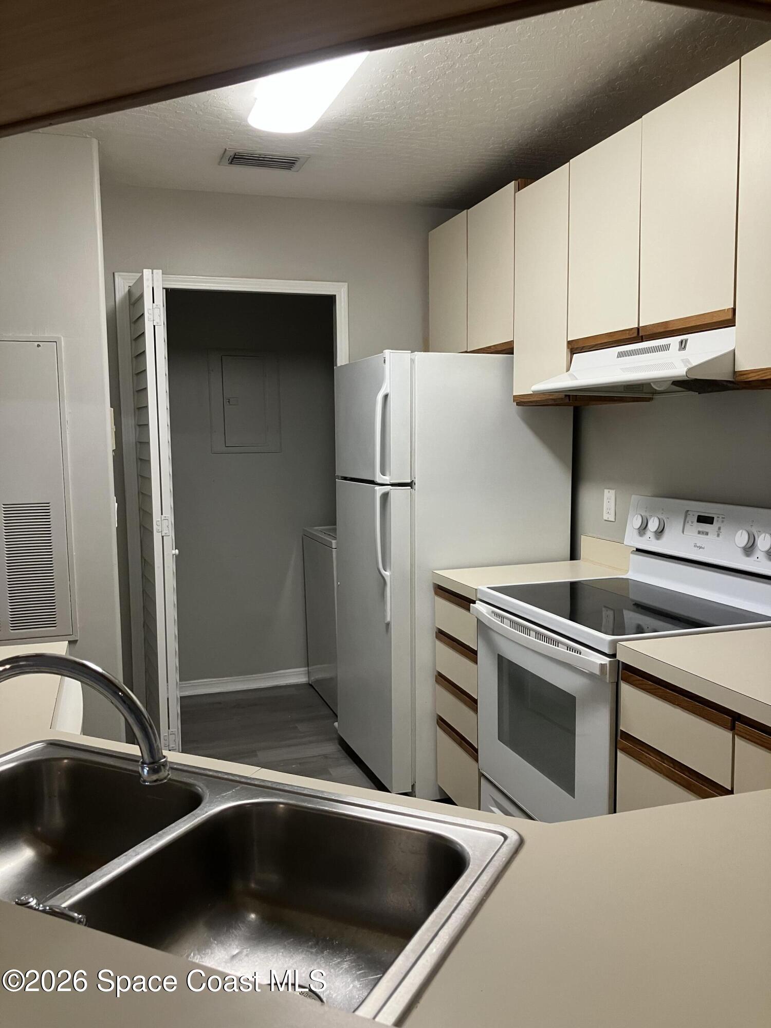 7667 North Wickham Road, Unit 1517 Melbourne, FL 32940 - Photo 14 of 22 Kitchen 2