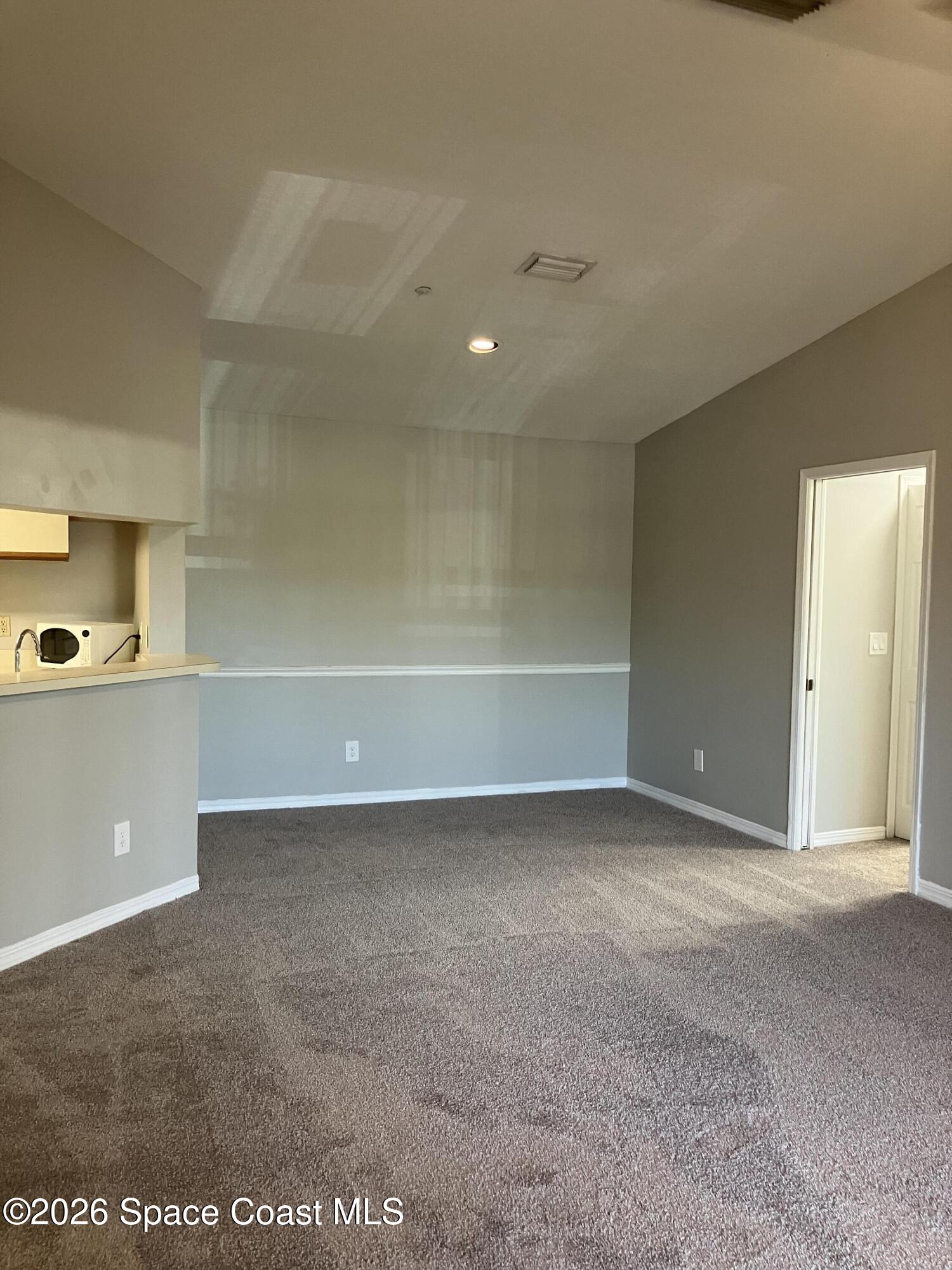 7667 North Wickham Road, Unit 1517 Melbourne, FL 32940 - Photo 16 of 22 Dining Area