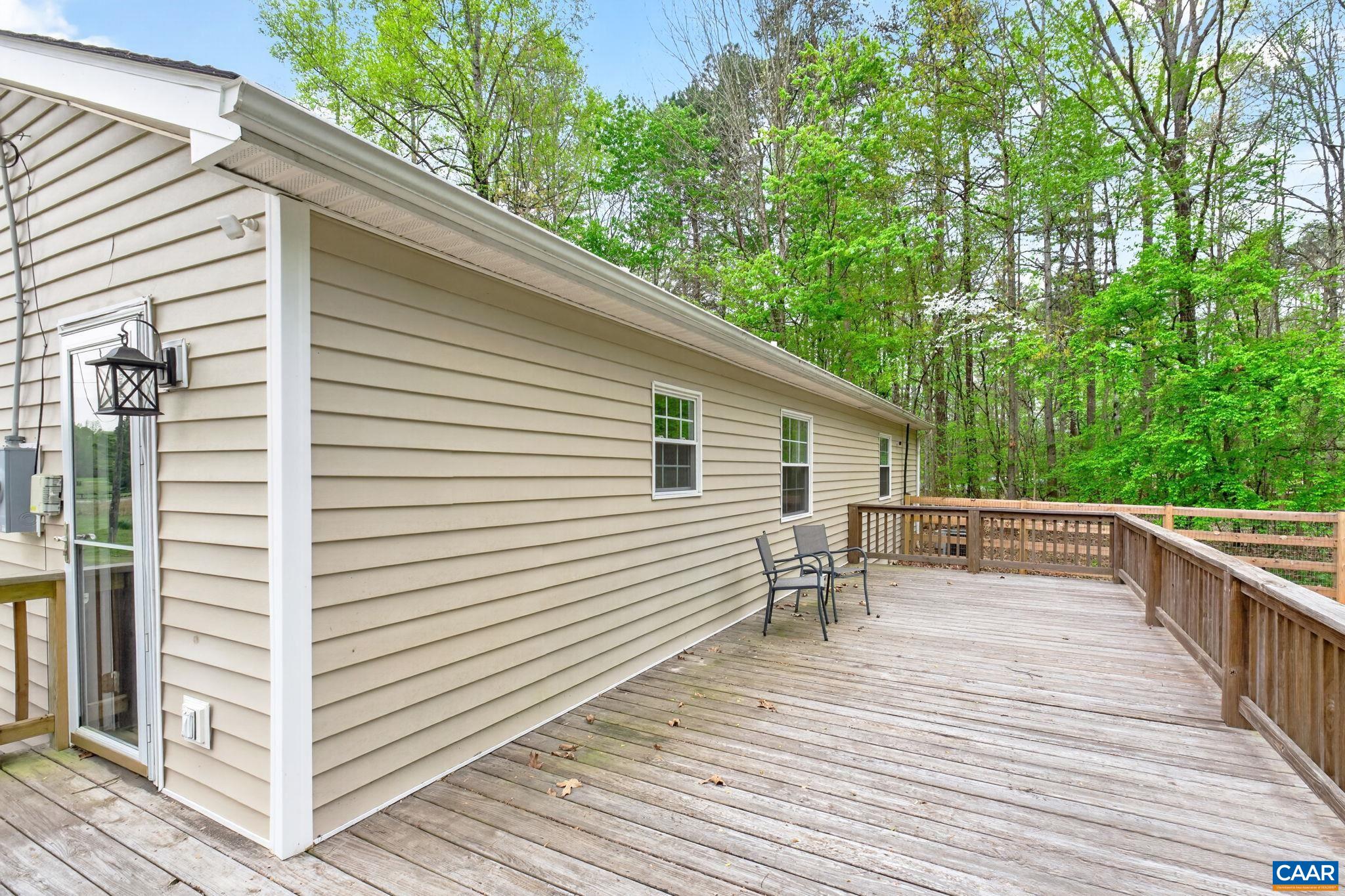 673 Cedar Lane Road Palmyra, VA 22963 - Photo 37 of 47 a view of a two chairs on the deck