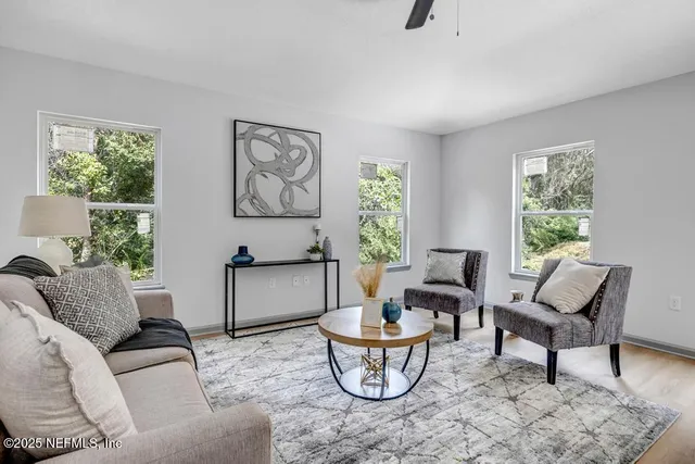 a living room with furniture and window