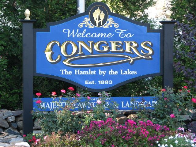 962 Rte 9W, Unit 106 Congers, NY 10920 - Photo 35 of 48 a sign that is sitting in front of flowers
