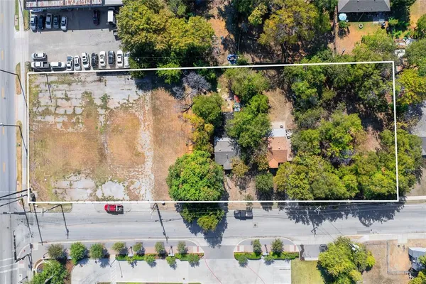 an aerial view of residential house with outdoor space