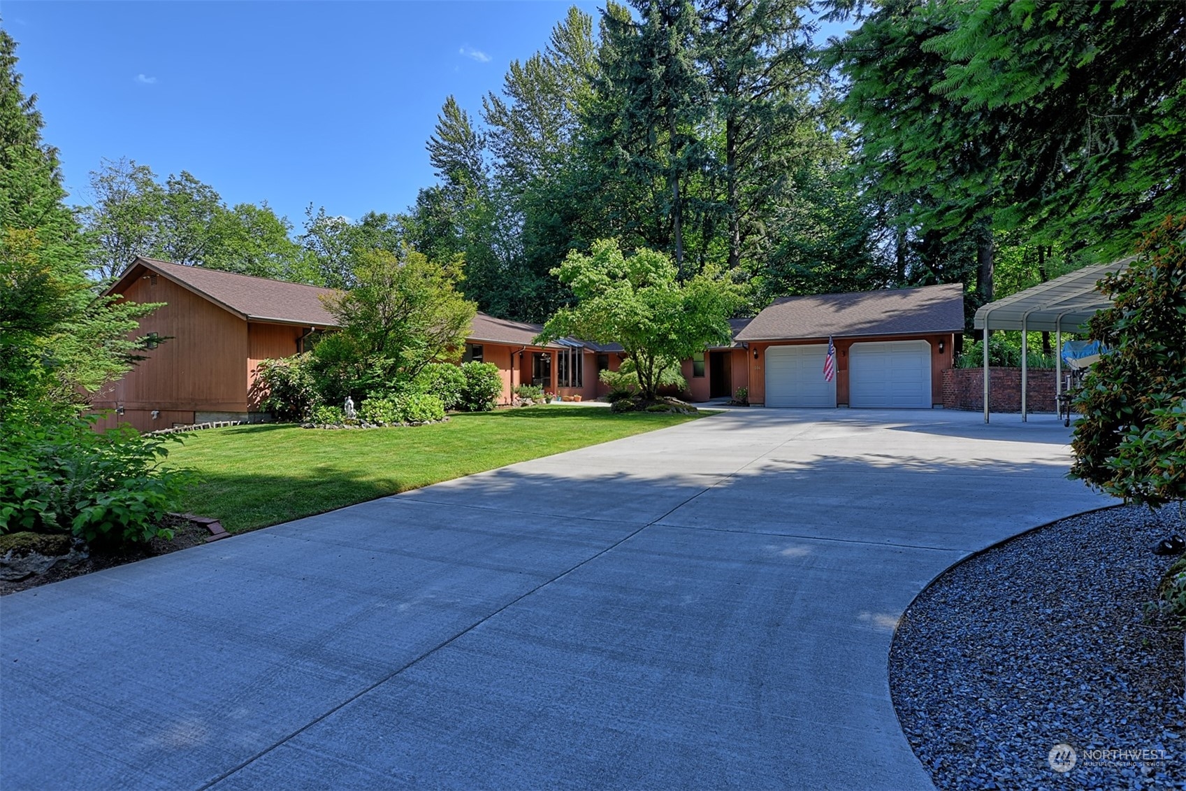a house view with a garden space