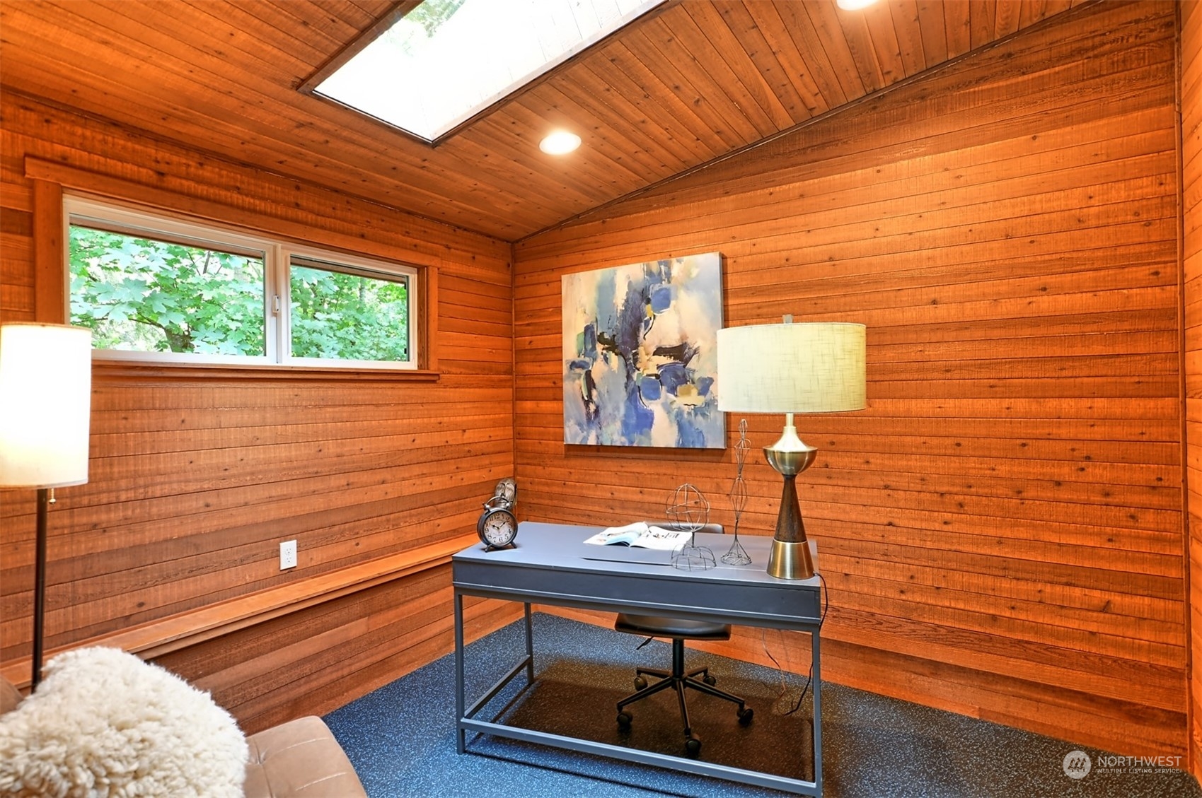 1004 218th Place Southeast Bothell, WA 98021 - Photo 16 of 30 a bench sitting on top of a wooden floor