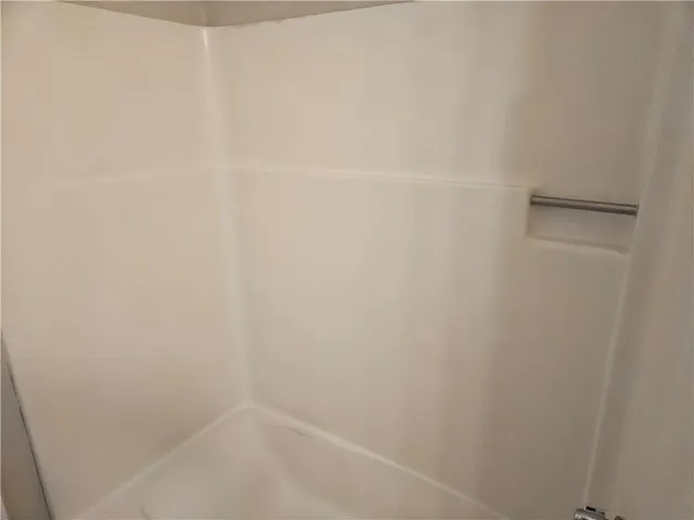 a close up of a white marble wall