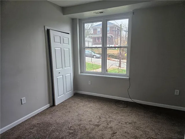 an empty room with a window