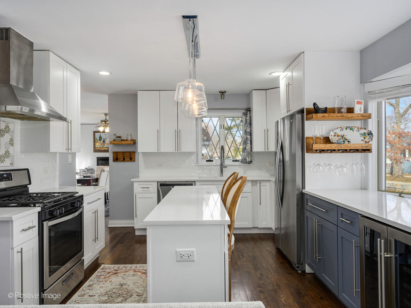 444 Selborne Road Riverside, IL 60546 - Photo 3 of 29 a kitchen that has a lot of cabinets a sink and appliances