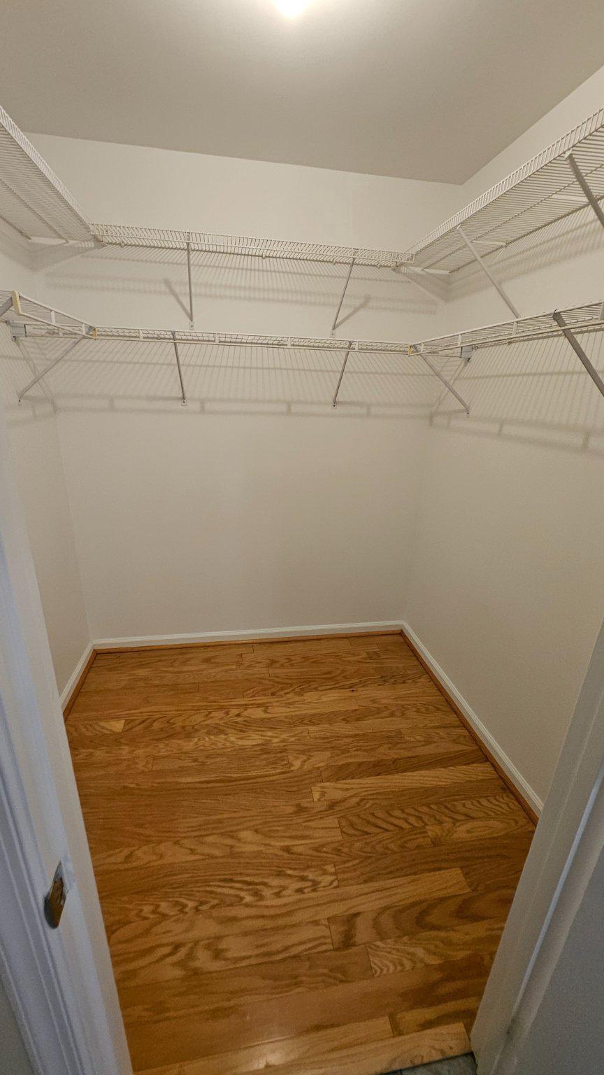 3801 Canterbury Road, Unit 703 Baltimore, MD 21218 - Photo 12 of 32 Primary Bedroom Walk-In Closet