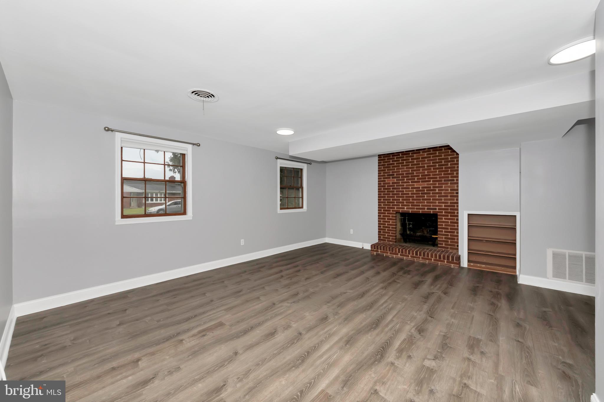 10810 Wheeler Drive Silver Spring, MD 20901 - Photo 36 of 43 Lower level living room w/fireplace