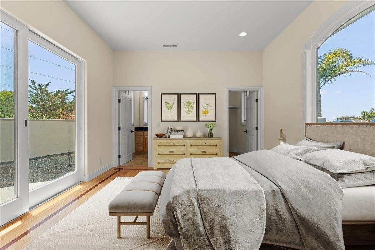 2100 Stone Ridge Drive Watsonville, CA 95076 - Photo 18 of 50 a spacious bedroom with a bed and a couch