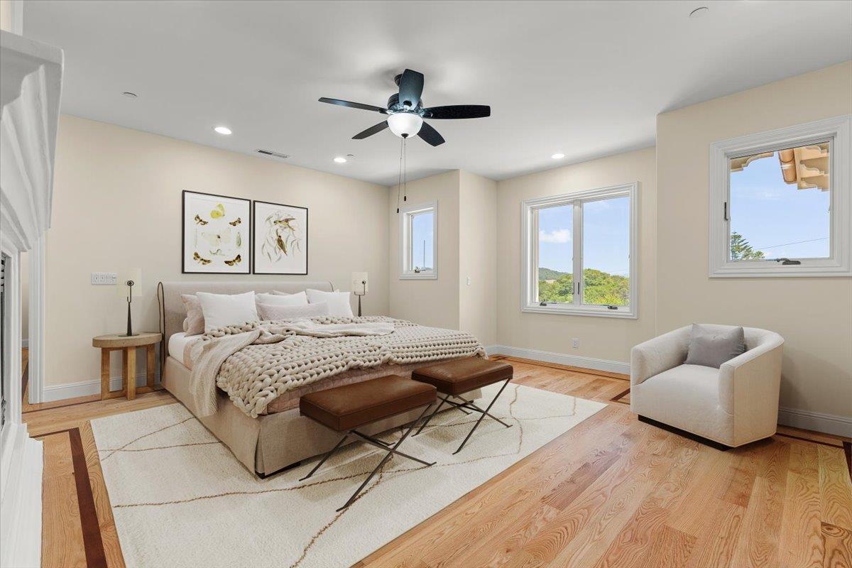 2100 Stone Ridge Drive Watsonville, CA 95076 - Photo 26 of 50 a spacious bedroom with a bed and a couch