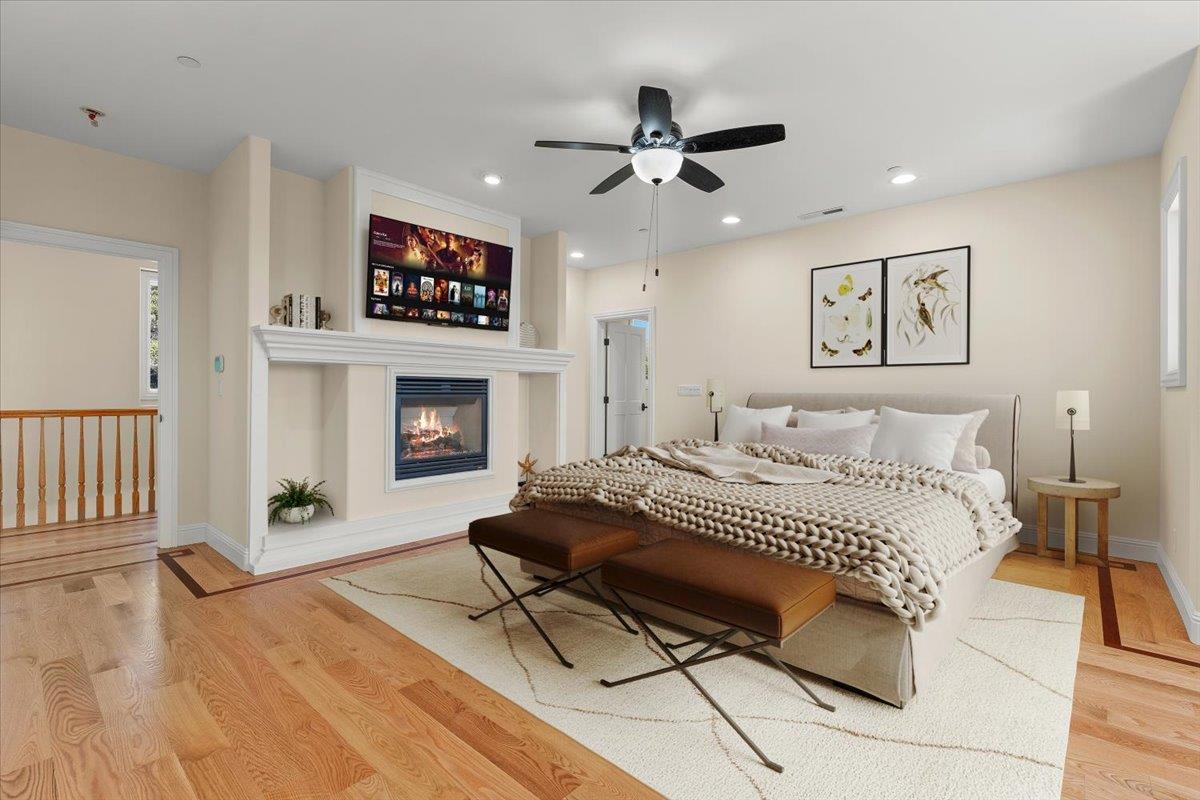 2100 Stone Ridge Drive Watsonville, CA 95076 - Photo 27 of 50 a living room with furniture a flat screen tv and a fireplace