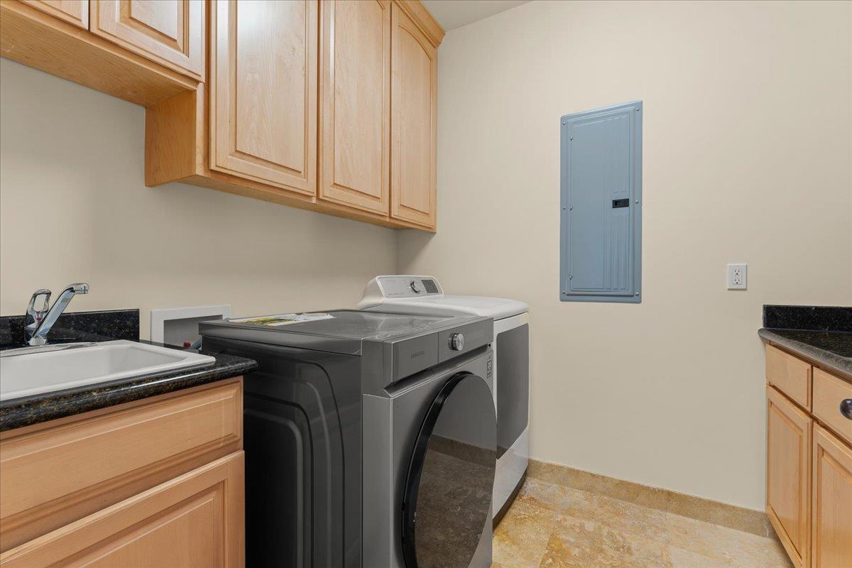 2100 Stone Ridge Drive Watsonville, CA 95076 - Photo 32 of 50 a utility room with sink dryer and washer