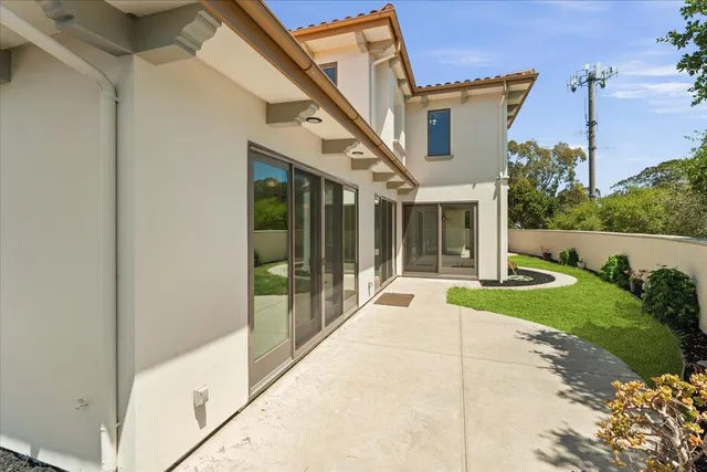 an aerial view of a house with a garden