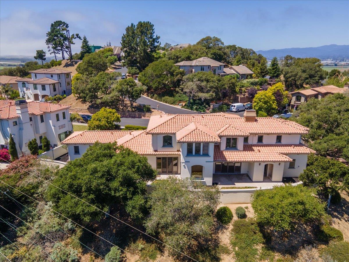 2100 Stone Ridge Drive Watsonville, CA 95076 - Photo 40 of 50 an aerial view of a house with a garden and lake view