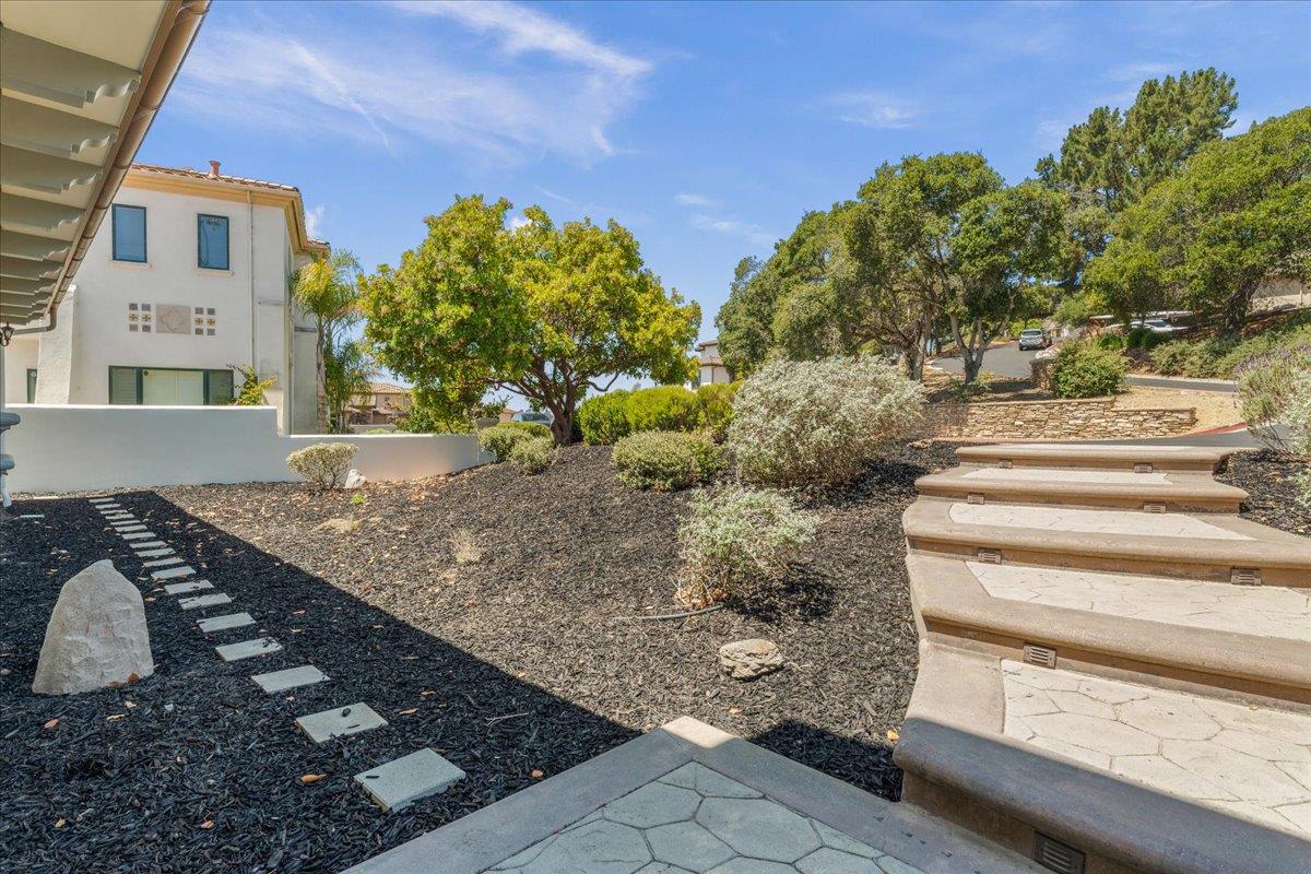 2100 Stone Ridge Drive Watsonville, CA 95076 - Photo 4 of 50 a view of a yard in front of a house