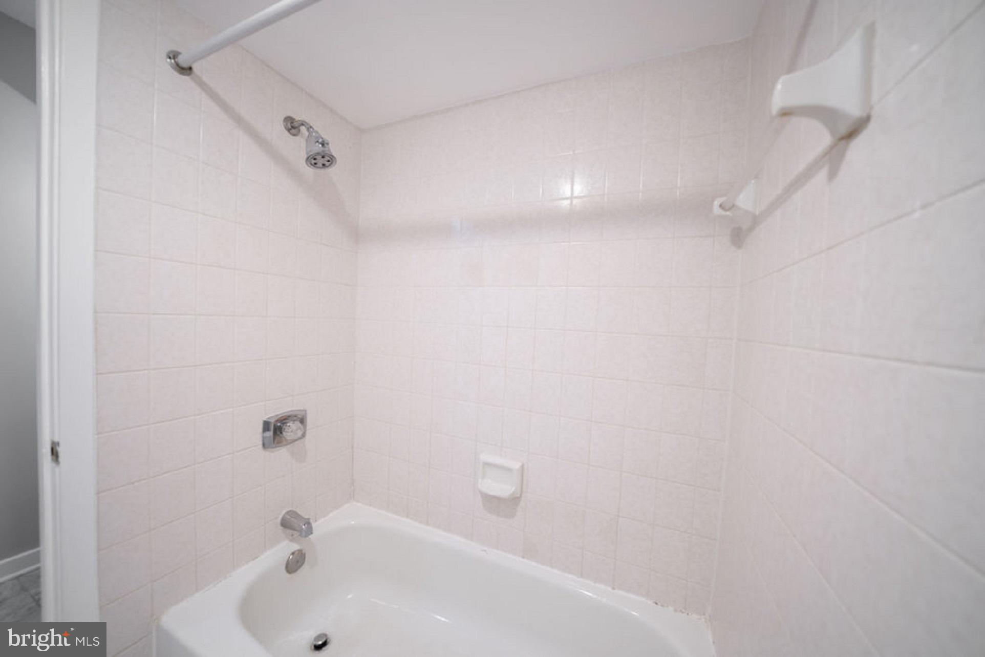 5505 Seminary Road, Unit 103N Falls Church, VA 22041 - Photo 16 of 59 a bathroom with a tub