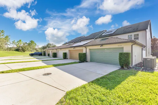 a view of a yard with an umbrella
