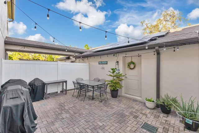 an aerial view of a house with a garden