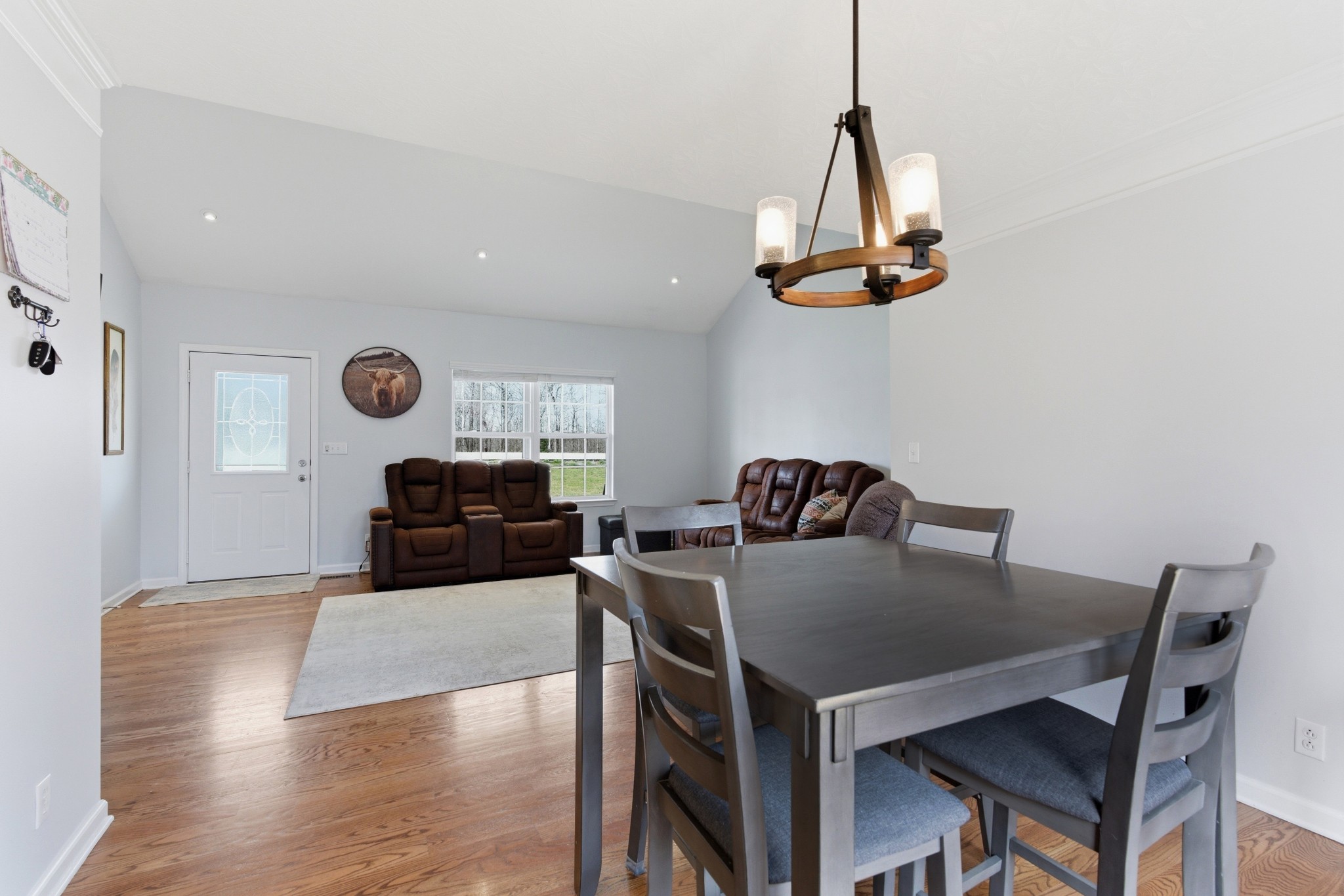 3080 Bowker Road Charlotte, TN 37036 - Photo 12 of 31 a kitchen with a table and chairs