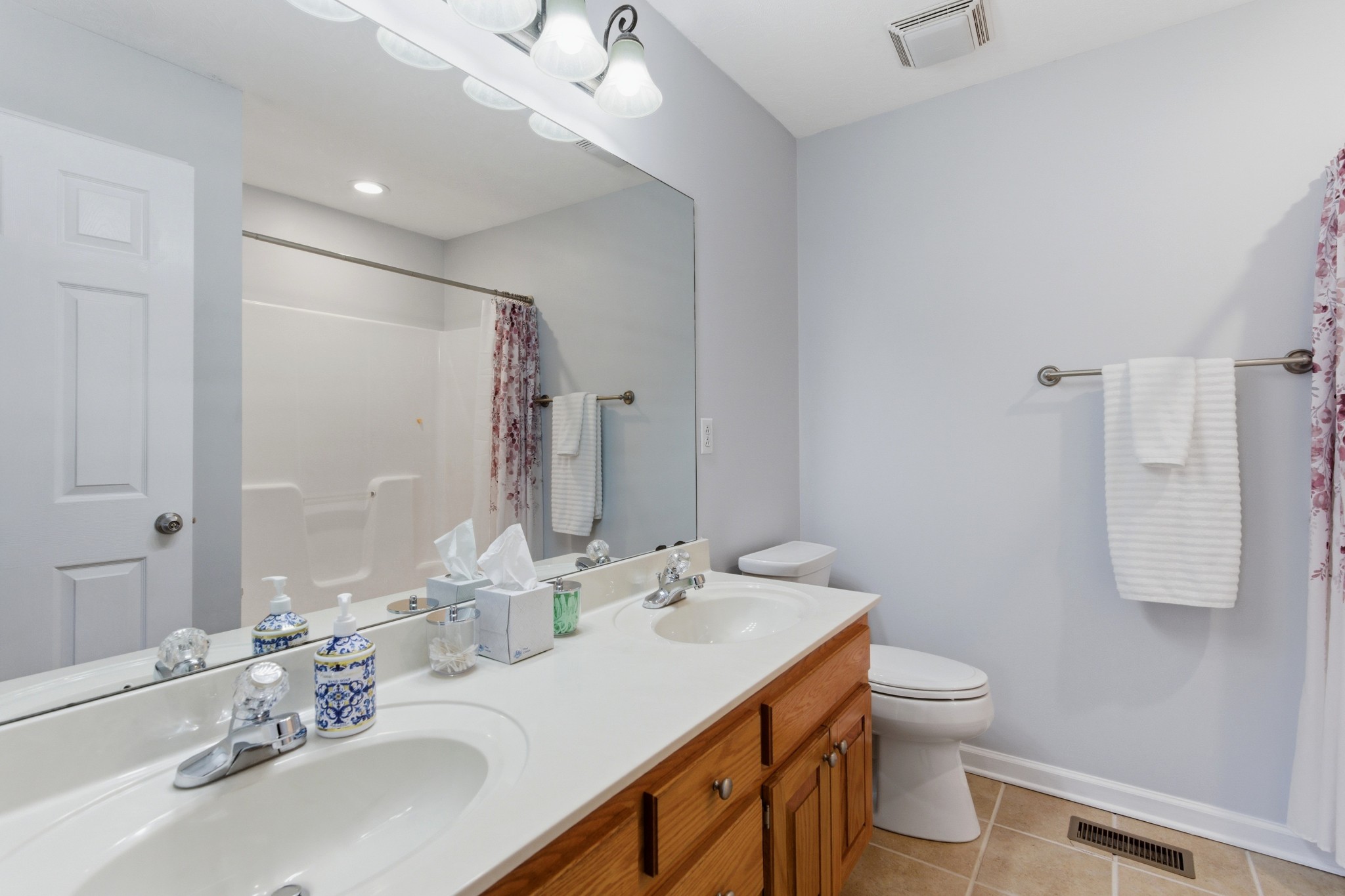 3080 Bowker Road Charlotte, TN 37036 - Photo 15 of 31 a bathroom with a sink toilet and shower